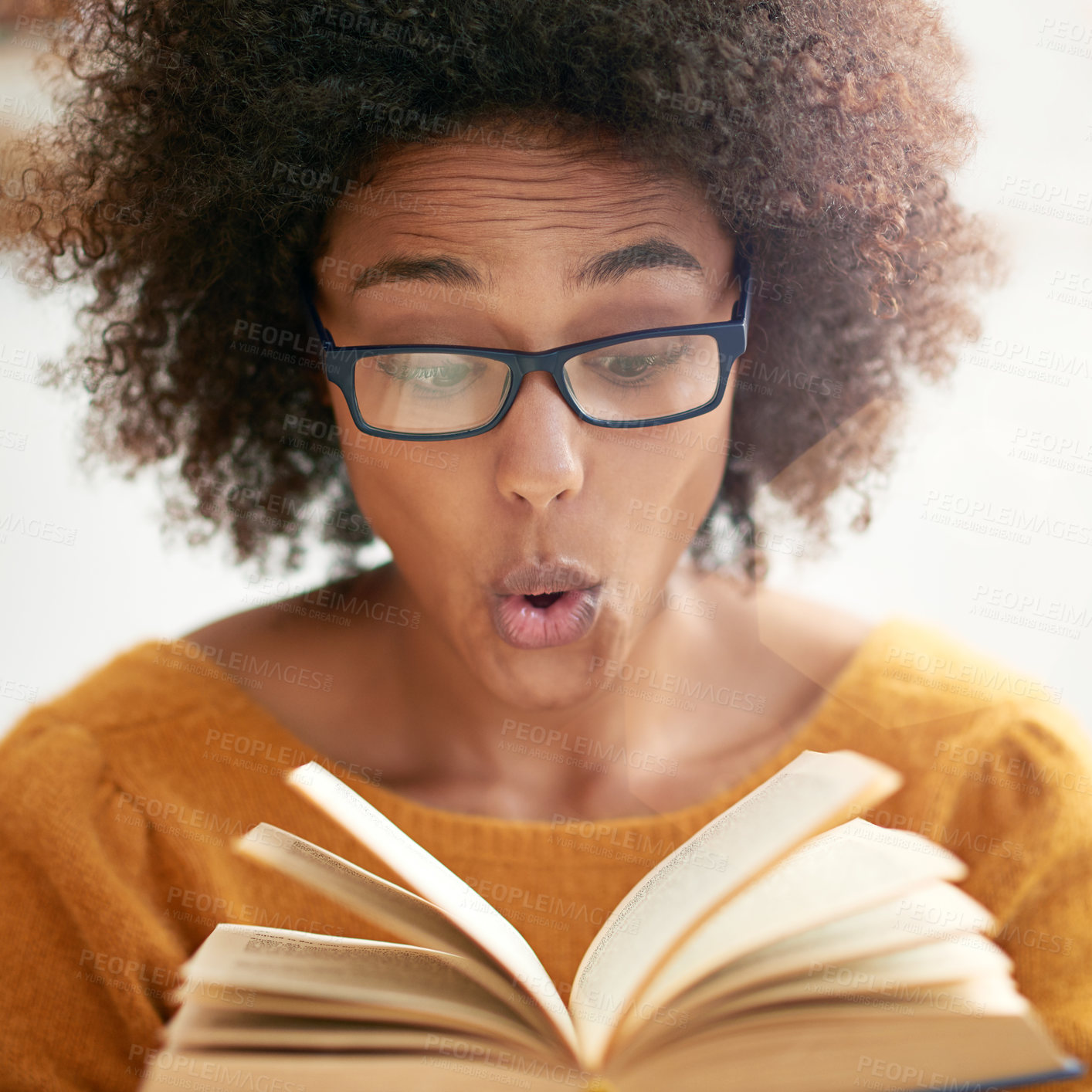 Buy stock photo Woman, book and reading or excited in library or literature knowledge or university education, story or information. Female person, glasses and shock learning or campus scholarship, school or college