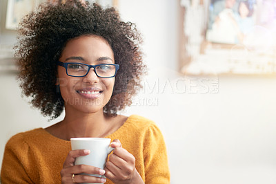 Buy stock photo Cropped portrait of a young young woman drinking a cup of coffee at home