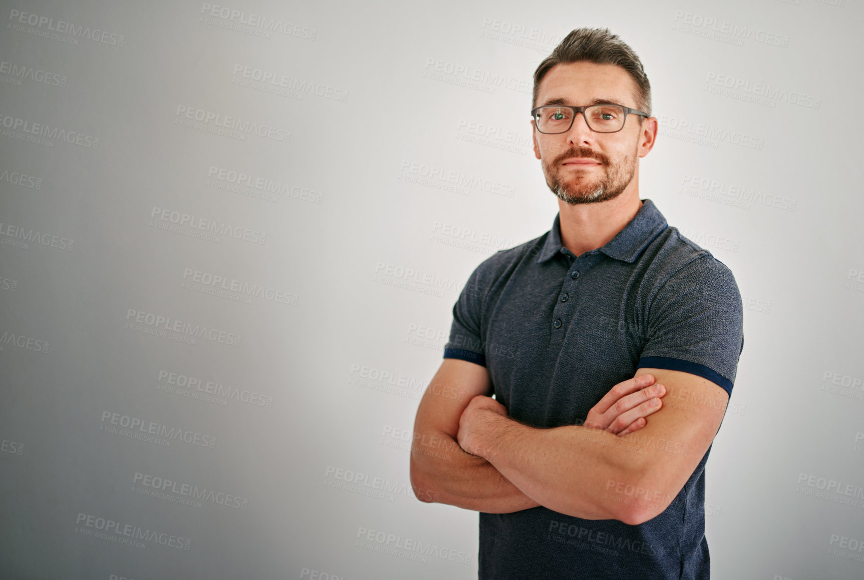 Buy stock photo Mockup, portrait and mature man with arms crossed, calm and casual outfit against a grey studio background. Face, male person and model with glasses, Canada and peace with confidence and happiness