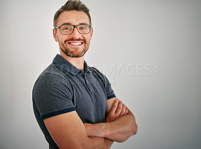 Buy stock photo Man, portrait and happy in studio of business, relax and confidence of employee or designer. Creative, staff and male person, startup and worker with pride, company and job or grey background