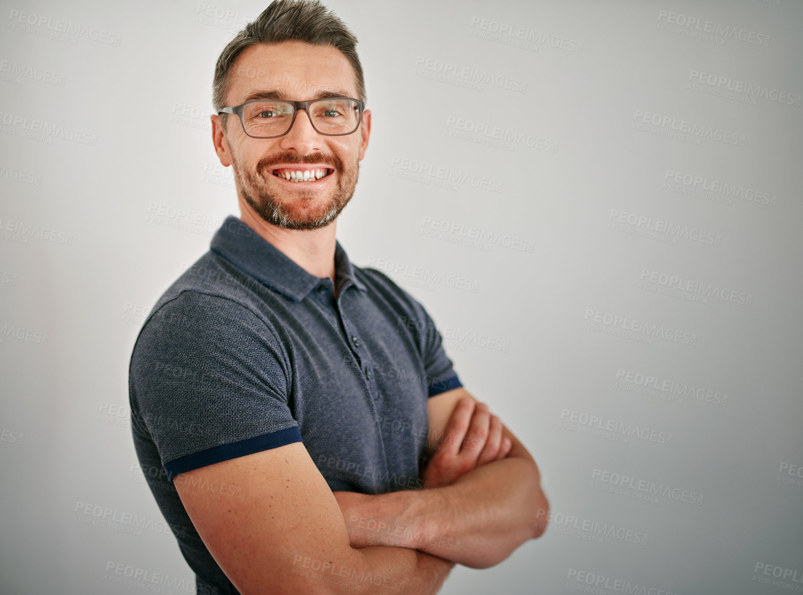 Buy stock photo Man, portrait and happy in studio of business, relax and confidence of employee or designer. Creative, staff and male person, startup and worker with pride, company and job or grey background