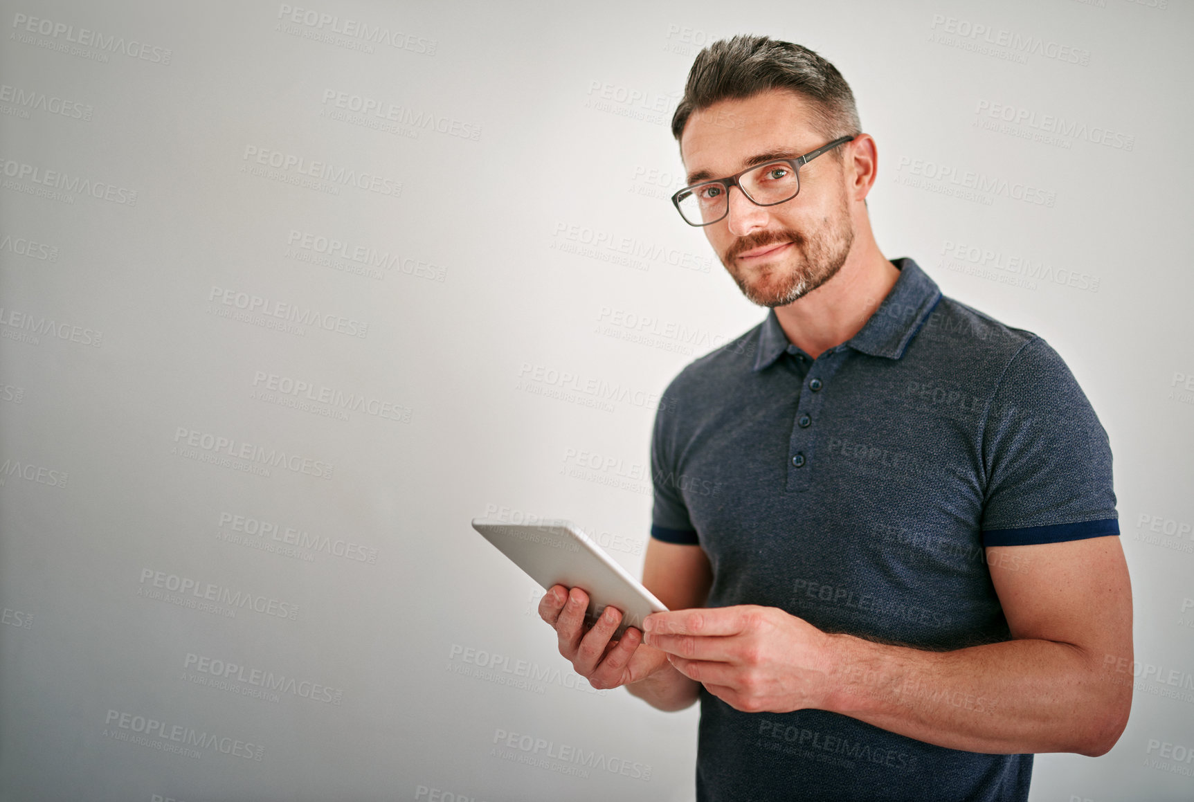 Buy stock photo Portrait, man and happy with tablet in studio on white background for ecommerce or network as technology  specialist. Mature person, businessman and smile for digital communication and connection