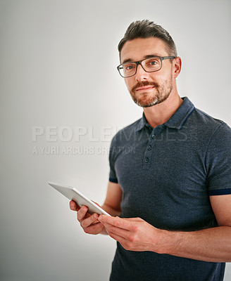 Buy stock photo Designer, studio and tablet with glasses, portrait and technology for social media and internet. Man, web and tech and confidence for creative work, career or job isolated on white background