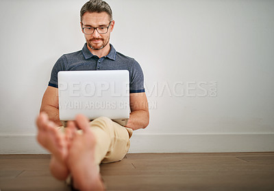 Buy stock photo Man, blog and mockup with freelance on laptop for relax in casual with social media for internet with technology. Male person, glasses and house with online writing for website, reading and hustle