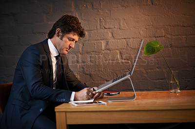 Buy stock photo Laptop, notes and businessman in office at night writing information for research or wall. Planning, computer and professional male attorney working on corporate legal case with deadline by desk