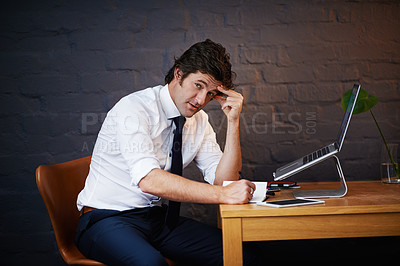 Buy stock photo Portrait of a businessman working late at the office