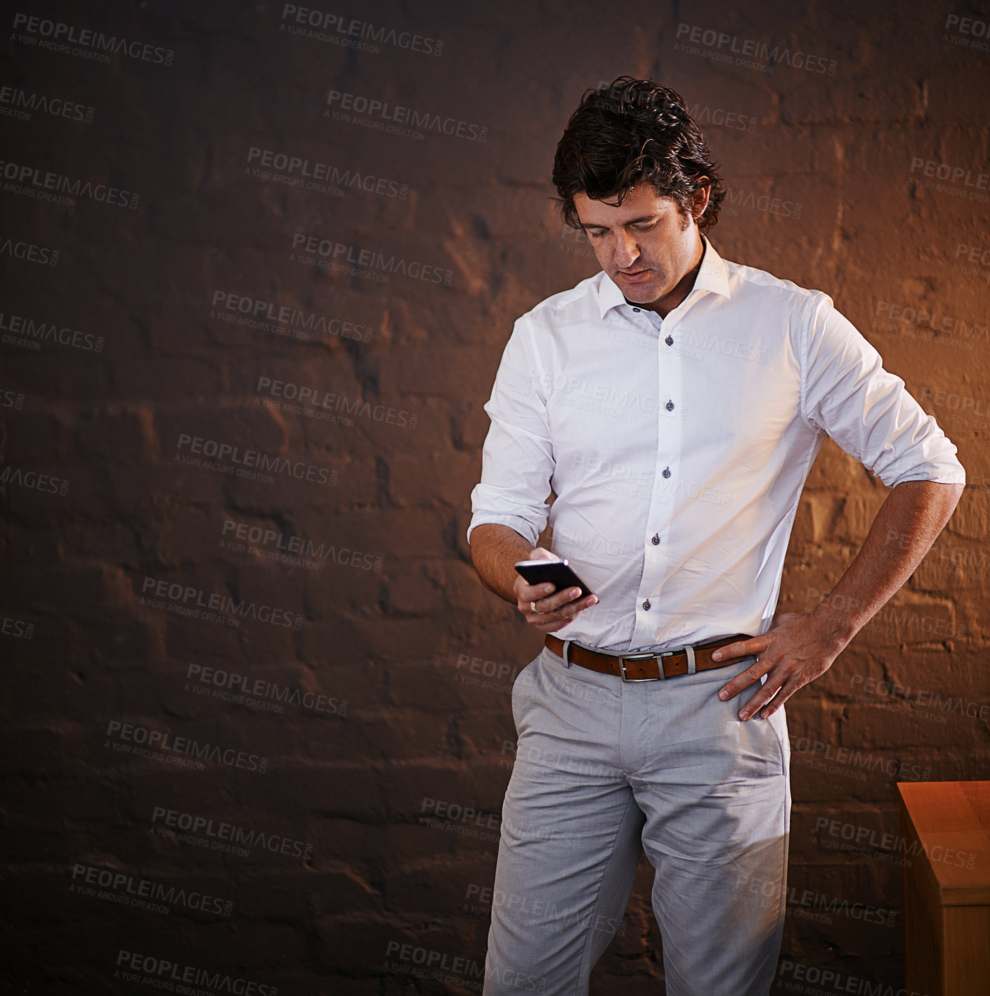 Buy stock photo Phone, communication and businessman in office at night reading email for company policy review. Contact, connectivity and male hr manager working overtime with cellphone for corporate networking.