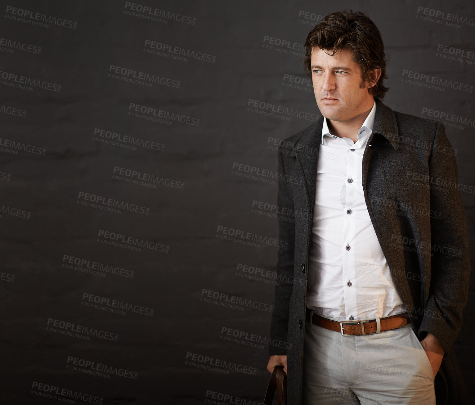 Buy stock photo Fashion, thinking and business man against brick wall for confidence, decision or ideas on dark background. Style, professional and salesperson with vision for opportunity, designer clothes or mockup