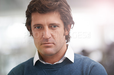 Buy stock photo Cropped portrait of a businessman in the office