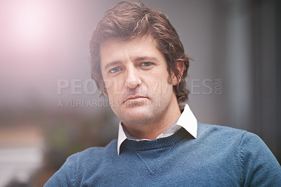 Buy stock photo Cropped portrait of a businessman in the office