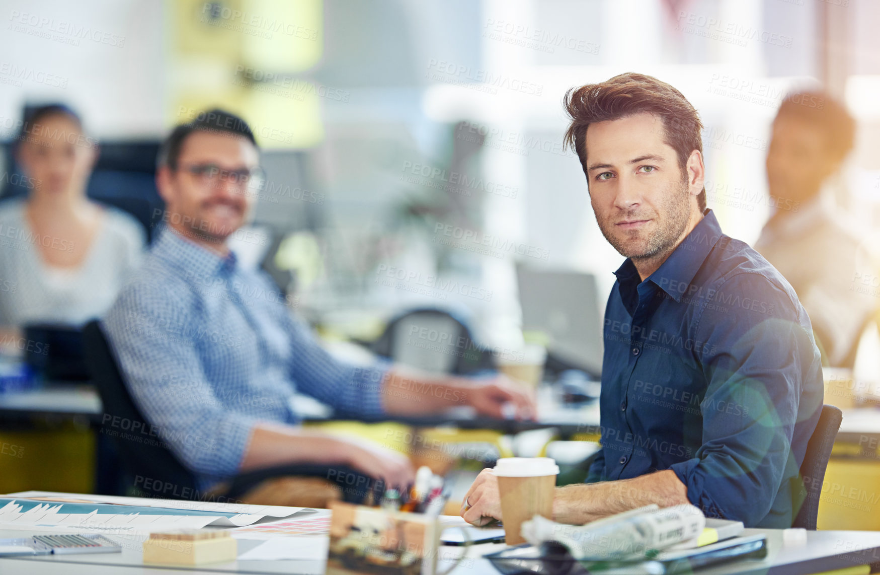 Buy stock photo Portrait of a group of coworkers working at their computers in an office