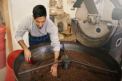 Buy stock photo Coffee, cafe and man with machine for roasting with blending, production and quality control. Entrepreneur, barista or person with beans at small business, sustainable startup and espresso process