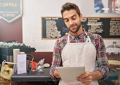 Buy stock photo Man, barista and tablet for typing in coffee shop with smile, thinking or communication for online order. Person, waiter and digital touchscreen for reading, click or check for ecommerce in cafeteria