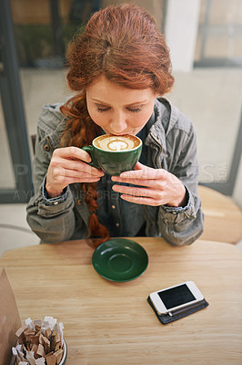 Buy stock photo Woman, cappuccino and happy in coffee shop with drink at breakfast to start morning from above at table. Girl, person and cup with flavor, aroma or relax in cafeteria with smile for service in Dublin