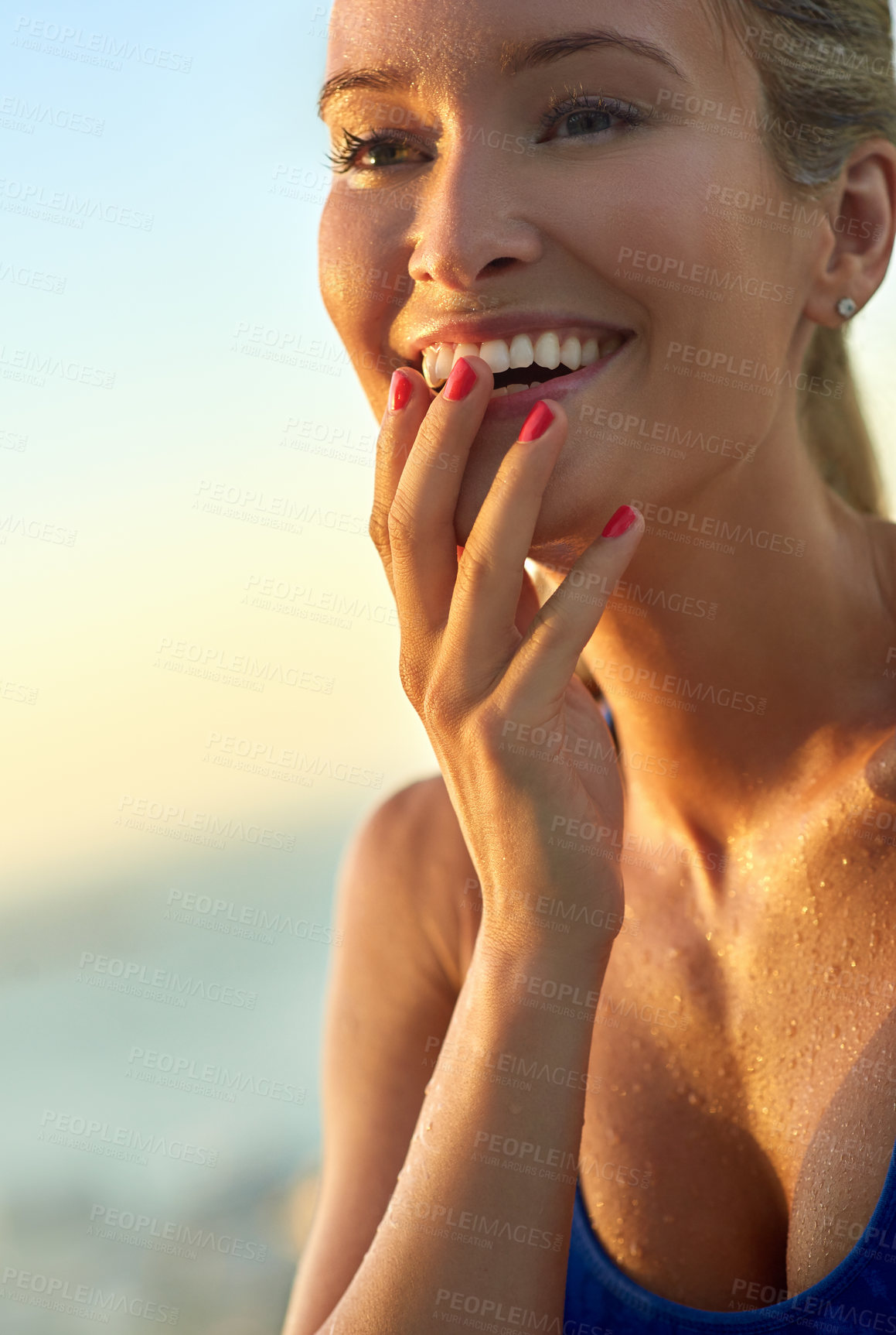 Buy stock photo Cropped shot of a sporty young woman standing outdoors
