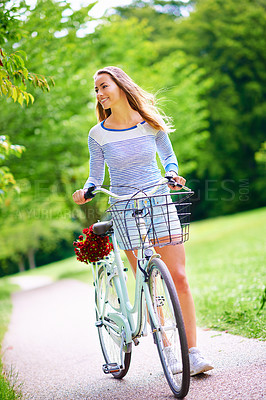 Buy stock photo Thinking, park and girl with bike, smile and eco friendly travel with weekend break, happiness or nature. Cycling, joyful or woman with sustainability, transportation and outdoor with summer or idea