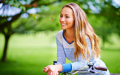 Buy stock photo Bicycle, smile and summer with woman in park for leisure, hobby or recreation outdoor to relax. Bike, nature and thinking with happy person in green environment for eco friendly transportation