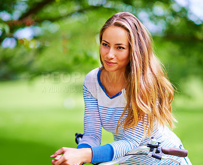 Buy stock photo Thinking, outdoor and girl with bicycle, nature and eco friendly travel with break, happiness and joy. Cycling, wonder and woman in park, sustainability and cheerful with summer, ideas or smile