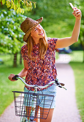 Buy stock photo Woman, selfie and bicycle in outdoor on holiday, social media and travel to capture memory. Female person, countryside and cycling on vacation in park, online and picture on adventure in nature