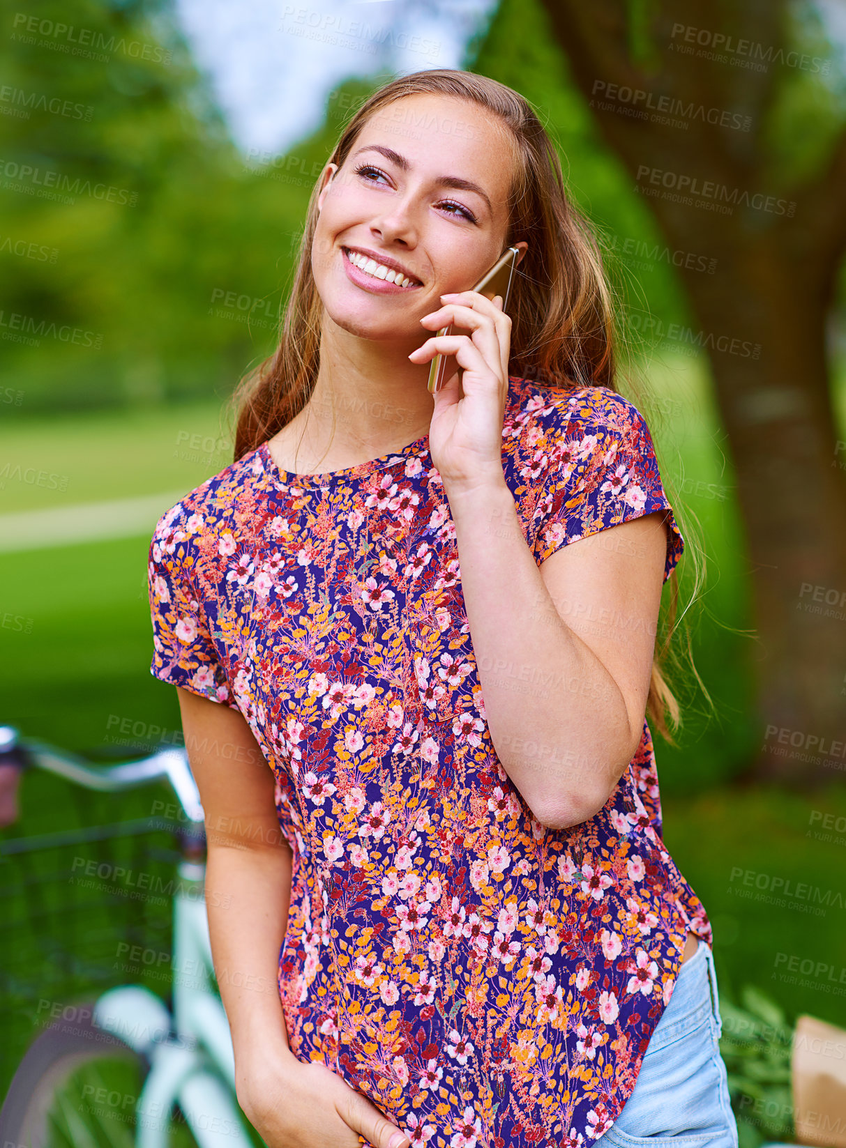 Buy stock photo Phone call, bicycle and girl in park with smile, chat and  connectivity on outdoor travel in morning. Communication, commute and happy woman talking with smartphone, bike and conversation in nature