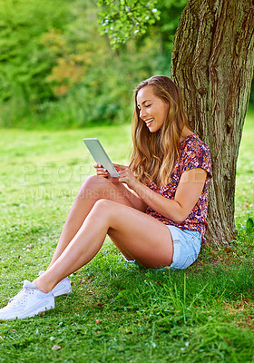 Buy stock photo Woman, nature and outdoor with tablet for connection, social media and happiness in park or backyard. Female person, technology and travel in countryside for rest, relax and zen as student on holiday