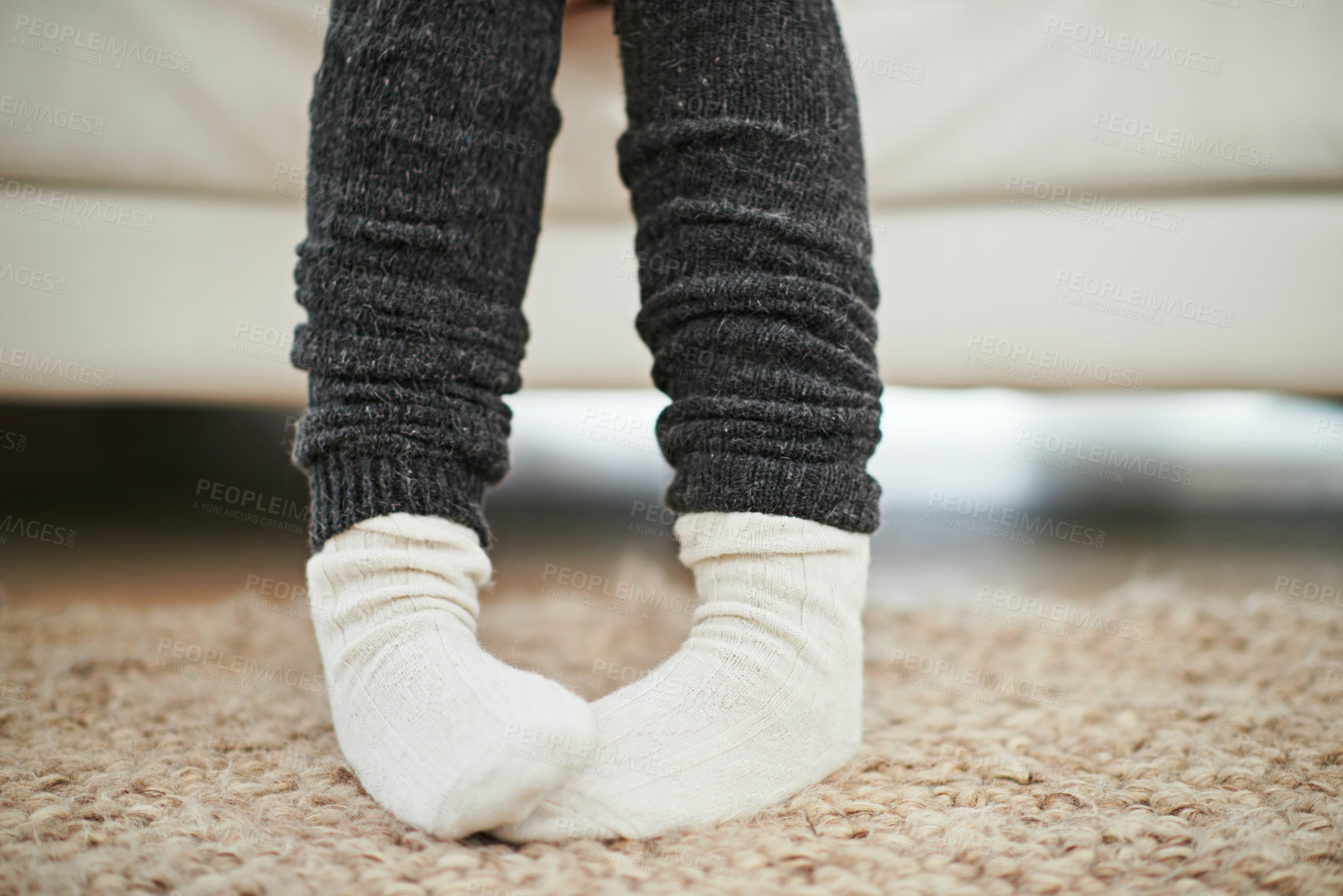 Buy stock photo Cropped shot of a woman wearing socks and leg warmers