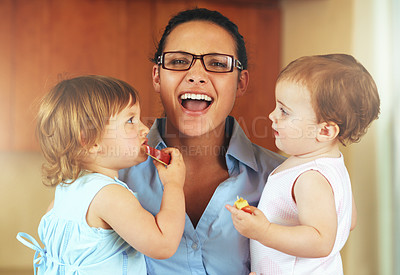 Buy stock photo Portrait, happy woman and stress with children in home with snack, fruit or apple slice for eating. Female person, remote work and multitask for productivity, job and childcare with kids in a house
