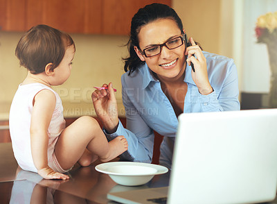 Buy stock photo Businesswoman, phone call and baby with laptop for feeding in kitchen for remote work, productivity and job. Mother, freelancer and technology for communication while multitasking with childcare