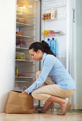 Buy stock photo Woman groceries and bag for fridge, kitchen and healthy food for diet, meal or nutrition. Female person, paper and packing of organic, fresh or produce for preparation of delicious, tasty or recipe  