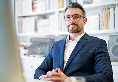 Buy stock photo Portrait, business and management with mature man at desk in office for corporate or professional career. Glasses, serious and suit with confident boss, CEO or manager sitting in company workplace