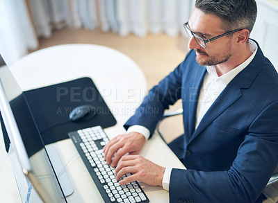 Buy stock photo Businessman or financial advisor and work with computer on email for planning a proposal above. Serious, worker and reading review or analyzing with technology for insight on report or review