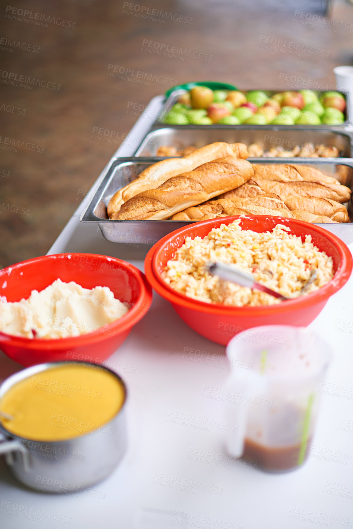 Buy stock photo Food, charity and table with soup, plate and bread for social responsibility, care and hope to stop hunger. Container, cup and meal at shelter with accountability, donation and support for nutrition