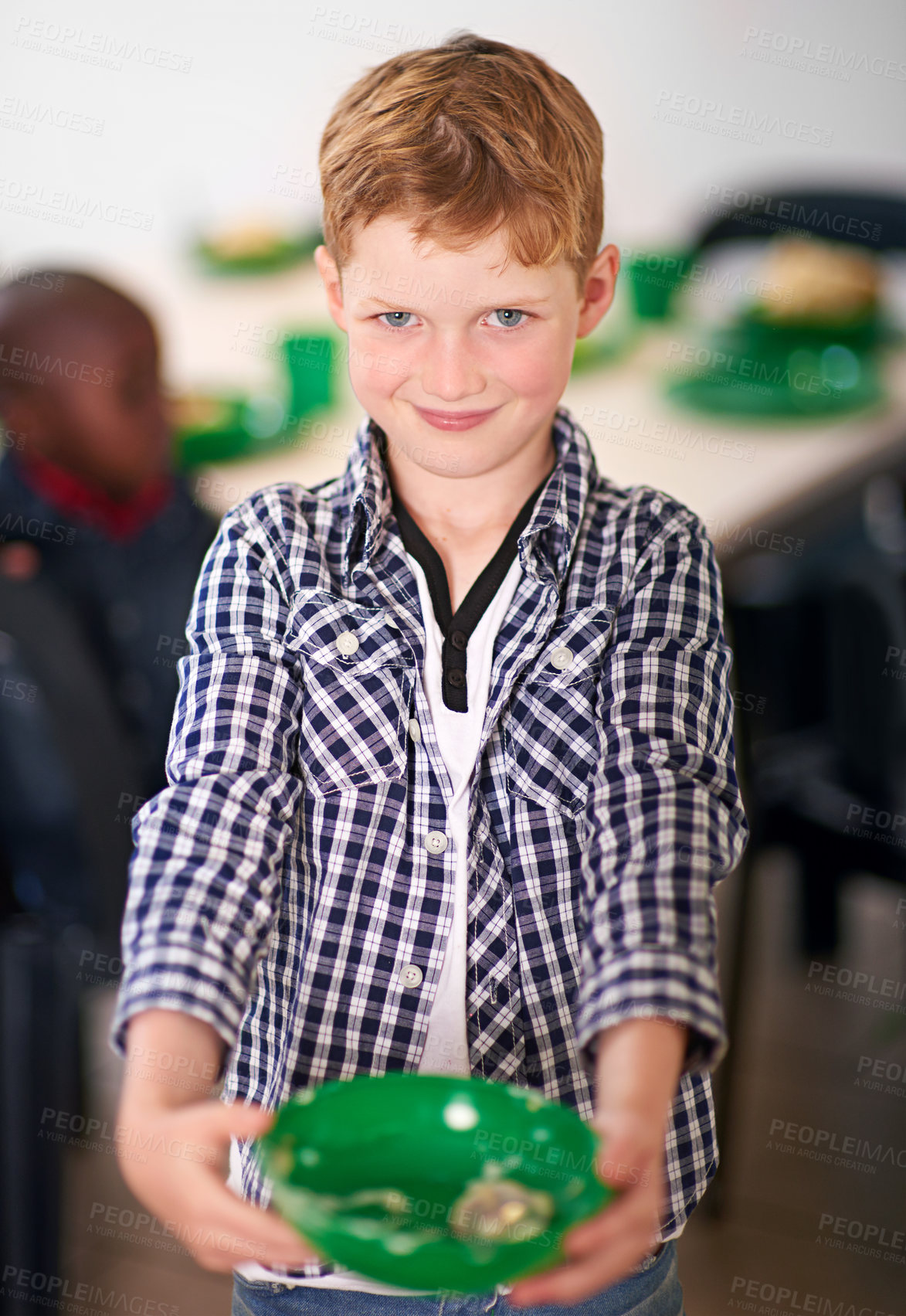 Buy stock photo Boy, plate and donation in portrait at shelter, soup kitchen and empty bowl for charity, care and meal. Child, smile and container for food, nutrition or lunch for poverty, kindness or call to action