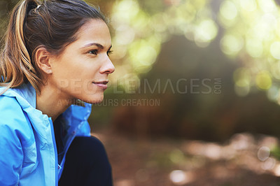 Buy stock photo Shot of a woman out for a train run