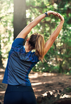 Buy stock photo Woman, stretch and arms in forest for run on trail in nature for fitness, summer and training for sport. Health, active and sportswear for hike with blood flow, muscle tension and flexibility.