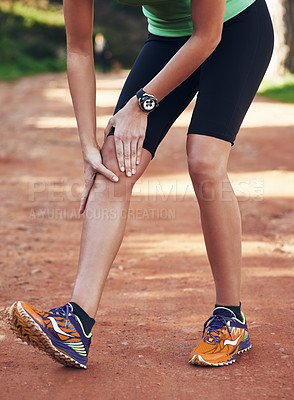 Buy stock photo Knee pain, hands and runner with training injury, fitness or sports fatigue in nature or park for marathon. Athlete or person stop running for leg strain, muscle and massage in forest workout or race