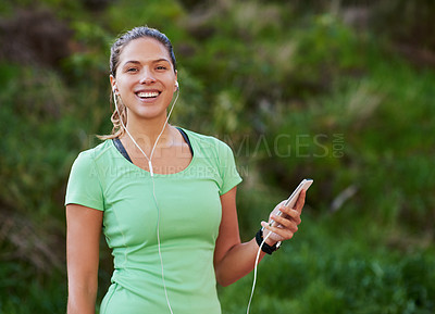 Buy stock photo Smile, music and latino woman in portrait for exercise, fitness and wellness in nature. Holding phone, break and female person in spots wear for training, cardio and workout for athletics in park