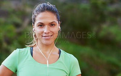 Buy stock photo Runner, portrait and happy woman listening to music for exercise or workout in park, woods or forest. Athlete, fitness and girl training in summer and streaming audio with resilience for challenge