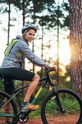 Buy stock photo Woman, portrait and forest on bicycle for adventure travel, fitness and wellness for competition. Athlete, mountain bike and cycling for workout, training and exercise with practice for marathon