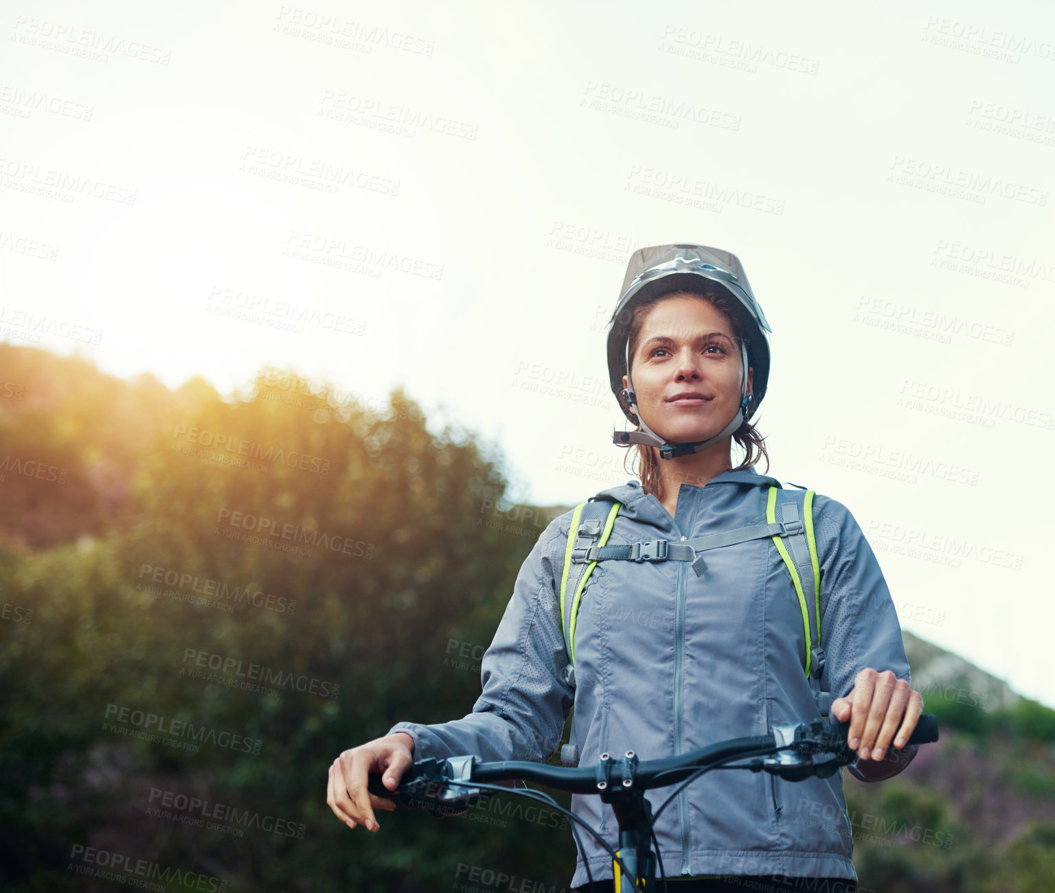 Buy stock photo Morning, woman and mountain bike in outdoors, fitness and cycling sports for cardio adventure. Female person, athlete and bicycle for exercise in nature, workout and training on sky mockup space