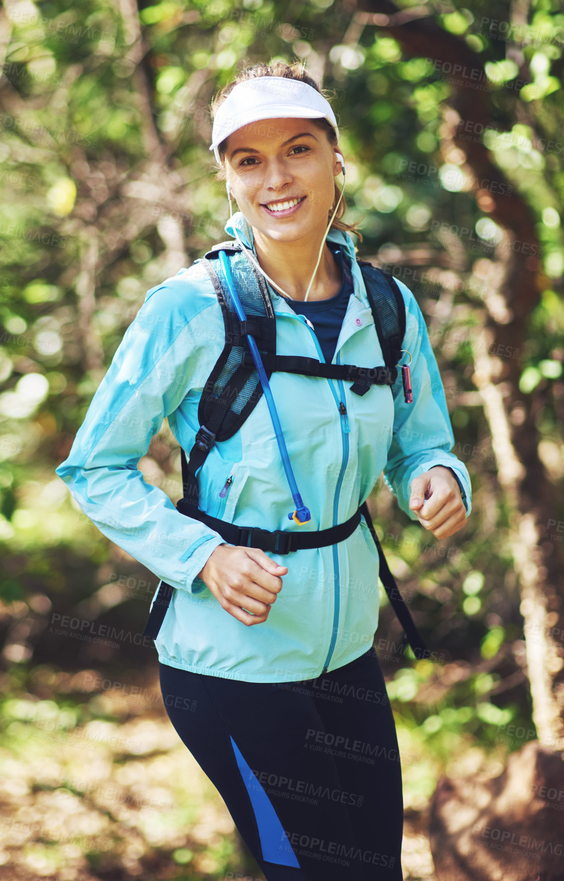 Buy stock photo Fitness, woman and hike with music for trail run, workout goals or exercise challenge in forest. Smile, female person and training in nature for marathon preparation, race or competition with audio