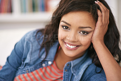 Buy stock photo Portrait of a young woman relaxing at home