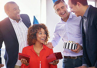 Buy stock photo Cropped shot of a group of coworkers celebrating a birthday