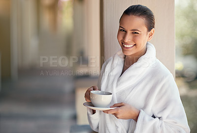Buy stock photo Shot of a young woman drinking a cup of coffee at the day spa