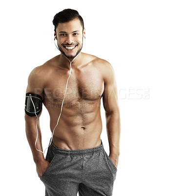 Buy stock photo Studio, athlete and portrait of man, earphones and muscle from exercise, workout and gym for fitness. White background, body builder and person with headphones, audio or abs with results for wellness