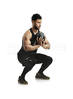 Buy stock photo Squat, man and kettlebell for fitness in studio as bodybuilder workout, training and exercise for strong muscle. Athlete, male person and weightlifting with body power for health on white background