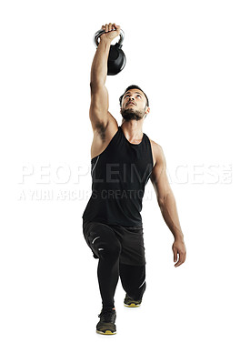 Buy stock photo Strength, training and man with kettlebell in studio for muscle, exercise and bodybuilding. Gym, equipment and person with balance in fitness for workout, resilience and endurance on white background