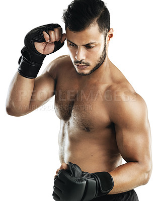 Buy stock photo Studio shot of a fit young man wearing boxing gloves against a white background