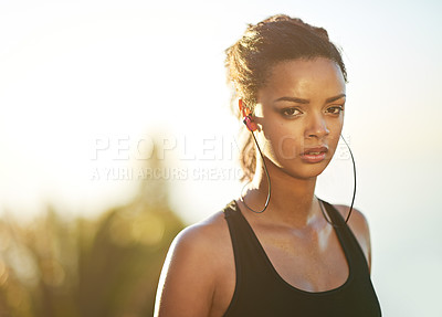 Buy stock photo Woman, portrait and outdoor fitness with earphones for streaming music, subscription or training. Female person, face and athlete podcast or playlist audio for running performance, cardio or sunset