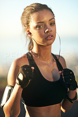 Buy stock photo Woman, athlete or boxer in outdoor portrait for exercise, training and fitness with earphones. Female person, fists or fighter workout in nature with music playing for endurance, sports or cardio